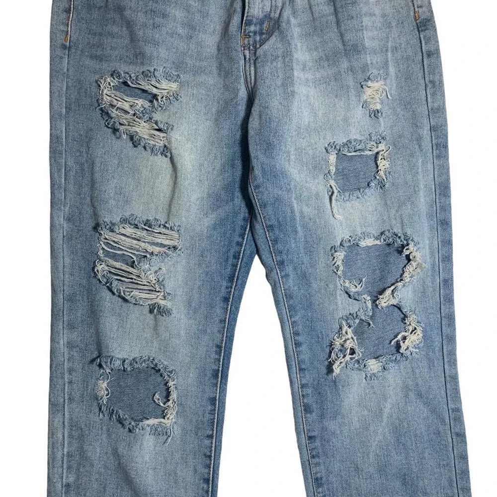 PrettyLittleThing | Women | Light Wash Extreme Distressed Mom Jeans | Size 29